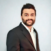 Ashish-Headshot-New-With Background